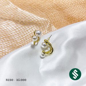 Khuyên tai vòng cung đính hạt ngọc, chui xỏ kết hợp hạt ngọc tao ra dáng khuyên lạ mắt